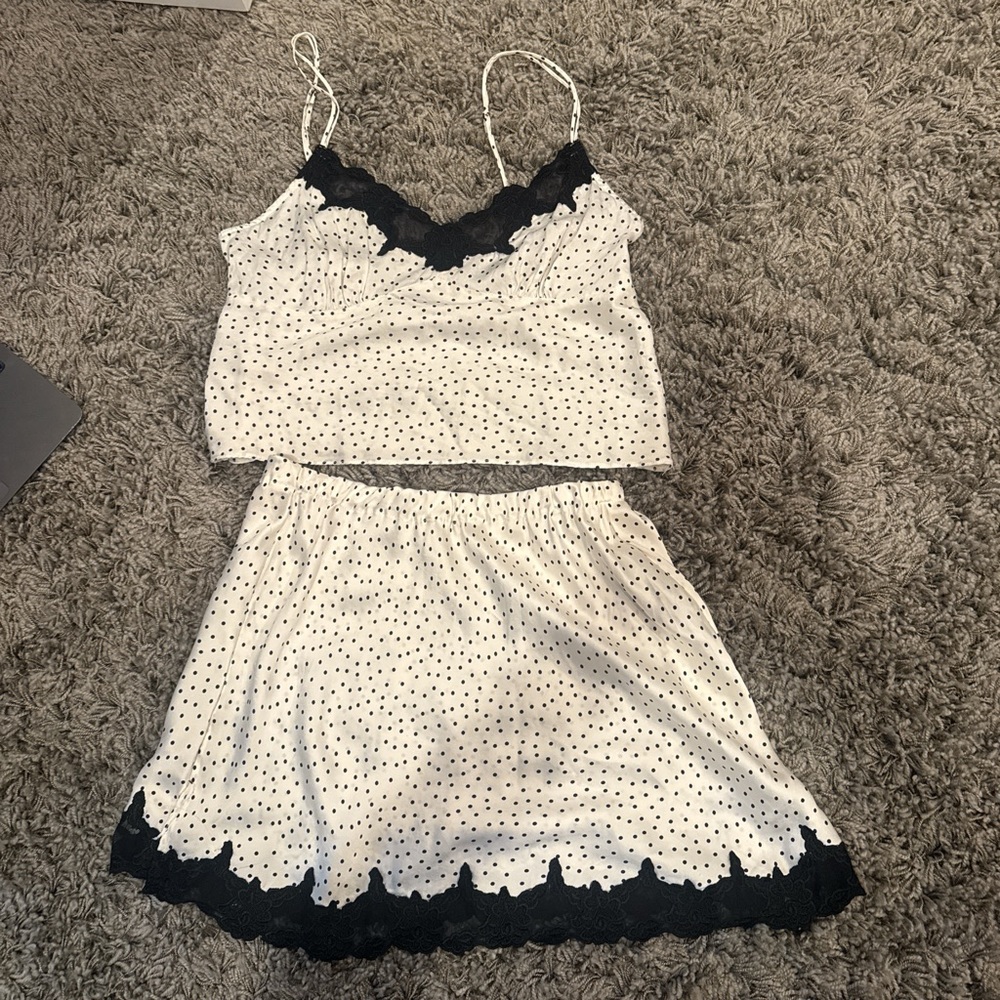 White and black polka dot lace set  
No size on the tag but fits like a medium